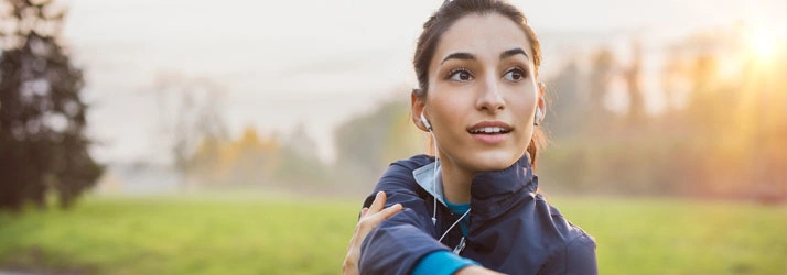 Chiropractic Campbell CA Woman Stretching Arm