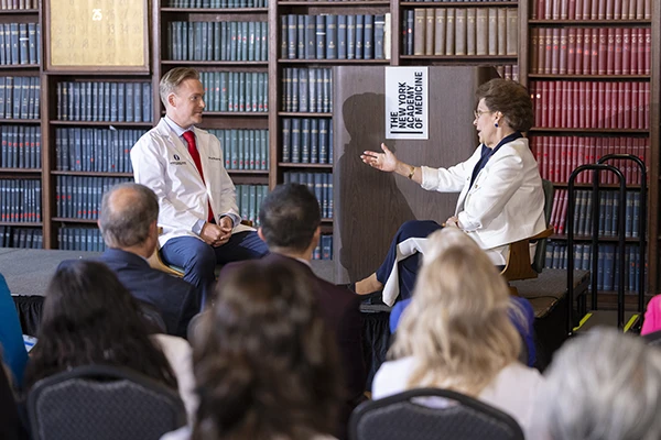 Dr. Bradley Mouroux Speaking with Antonia Novello the 14th Surgeon General of the United States
